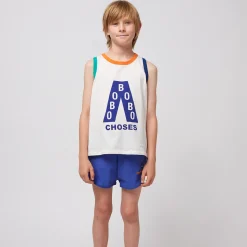 A Day At The Beach Swim Trunks by Bobo Choses