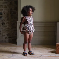 Bridget Romper in Patchwork Print by Little Cotton Clothes