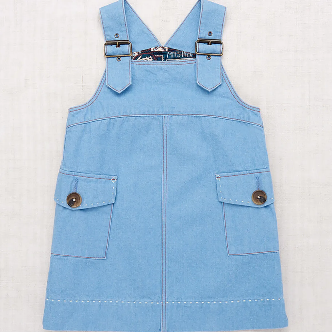 Buckle Jumper Dress in Baby Blue by Misha & Puff