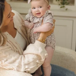 Collared Romper in Mauve Ditsy by Quincy Mae