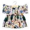 Daisy Dress (34cm Doll) in Alice Print by Minikane X Nathalie Lete