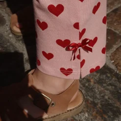 Drey Slit Pants in Amour Rouge by Konges Slojd