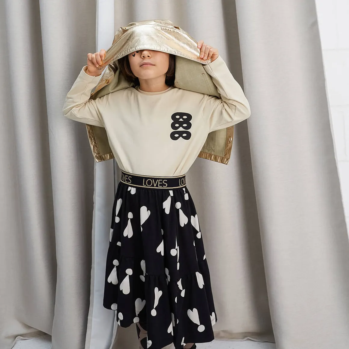 Exclamation Hearts Asymmetric Skirt in Black by Beau Loves