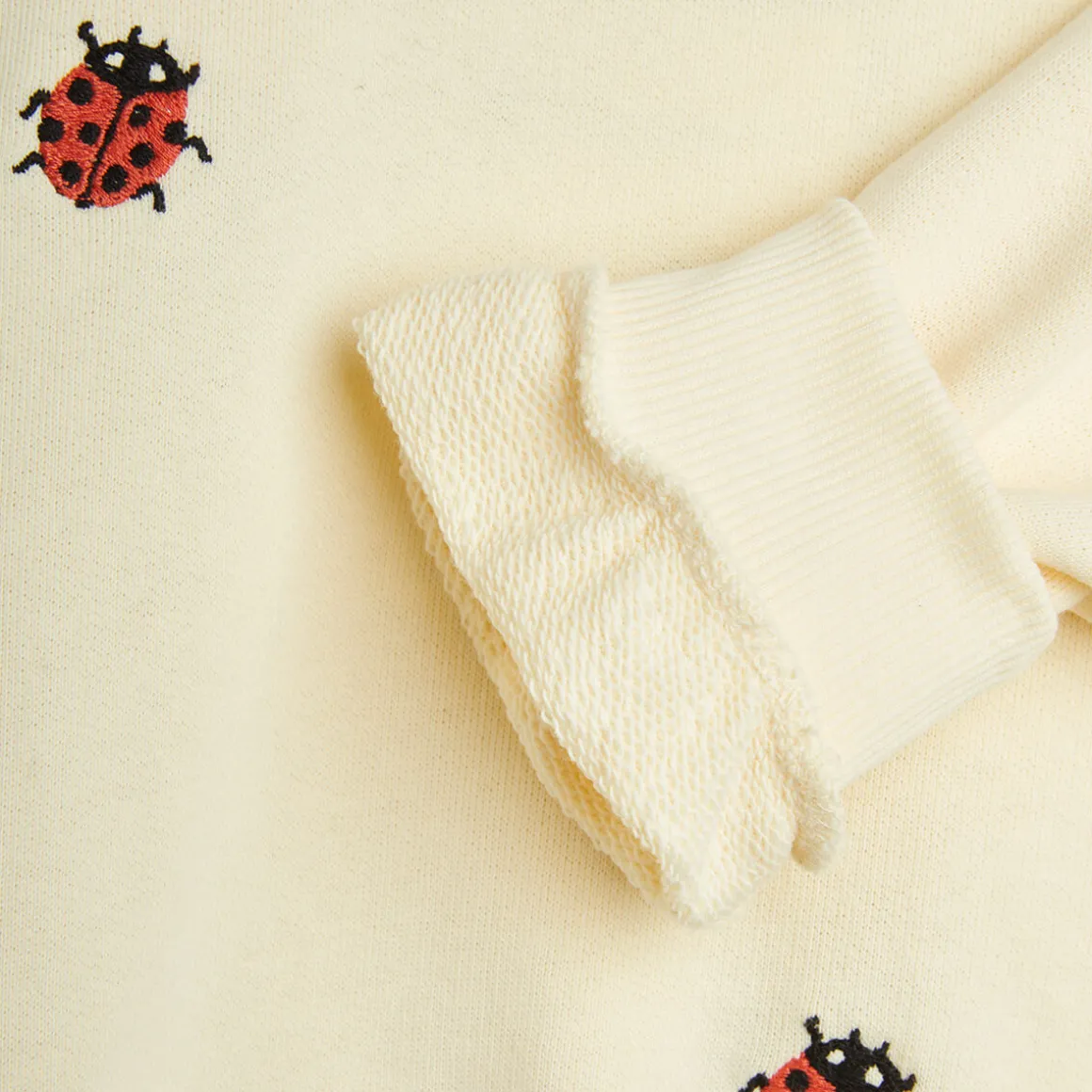 Ladybugs Embroidered Lace Sweatshirt in Off White by Mini Rodini