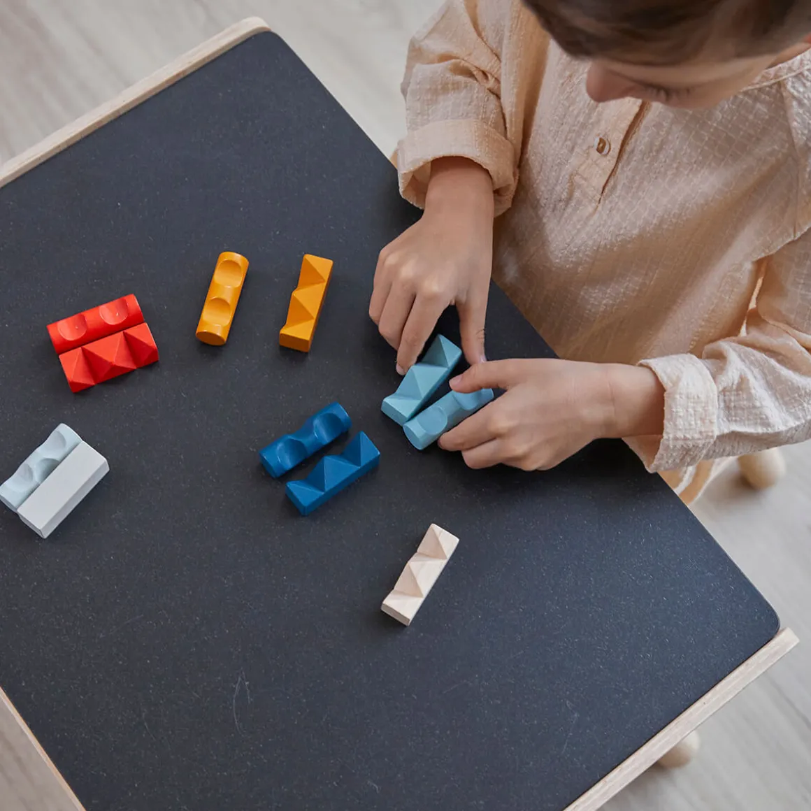 Log Puzzle by PlanToys
