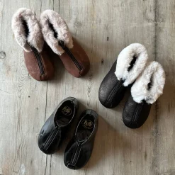Patent Leather Booties in Black by PèPè