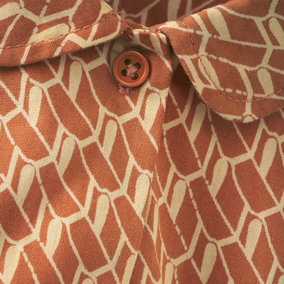 Penguin Dress in Apricot Geo Print by Caramel