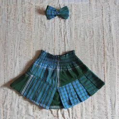Pleated Skirt With Hair Clip in Green Lungi Check by Bonjour