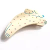 Rainbow Puppy Hair Claw by Winona Irene