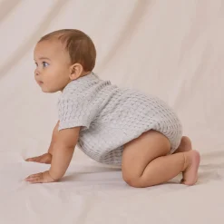 Relaxed Short Sleeve Bubble Romper in Sky by Quincy Mae