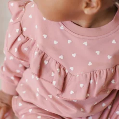 Ruffle Sweatshirt in Lipstick Hearts by Quincy Mae