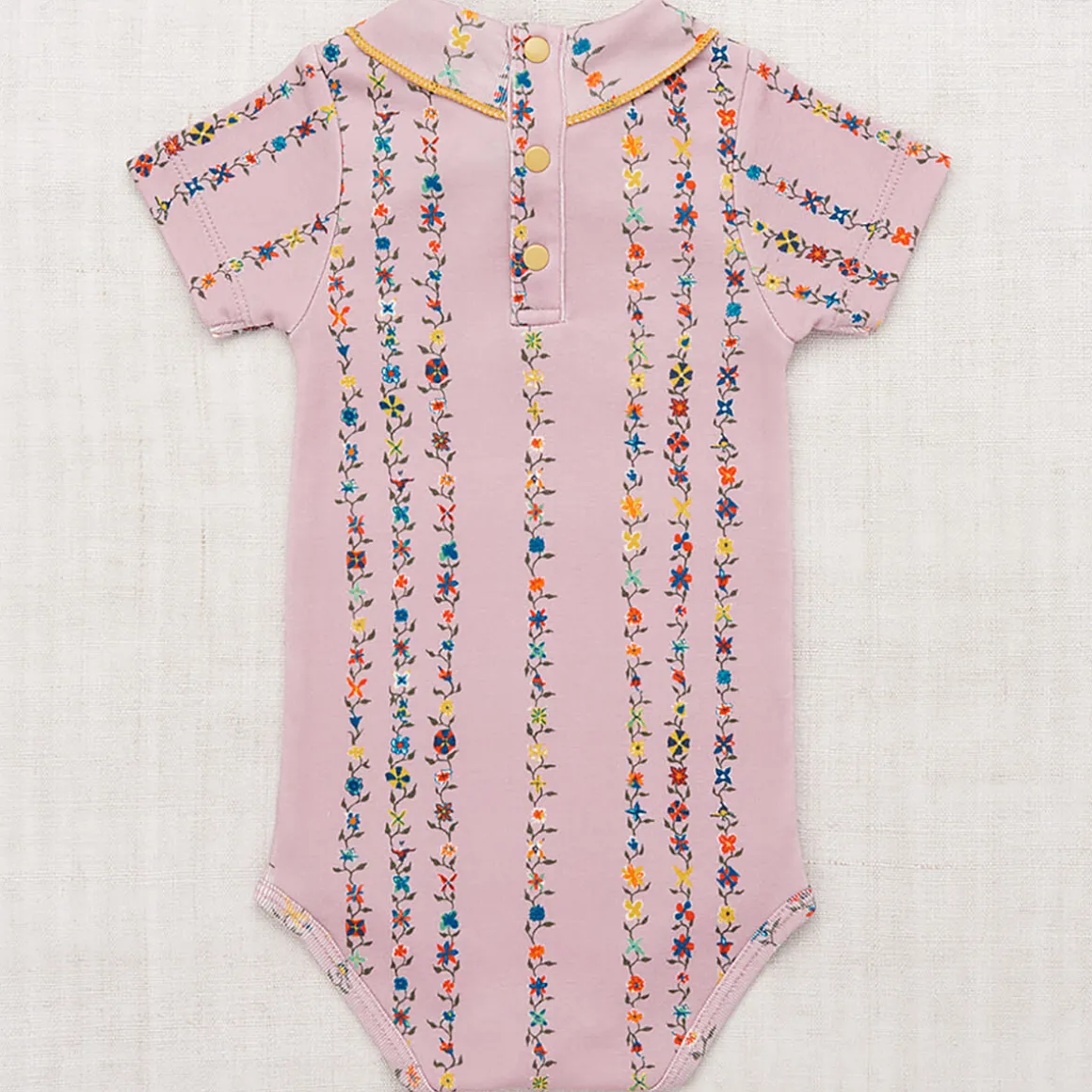 Short Sleeve Scout Onesie in Plum Petal Little Botanica by Misha & Puff