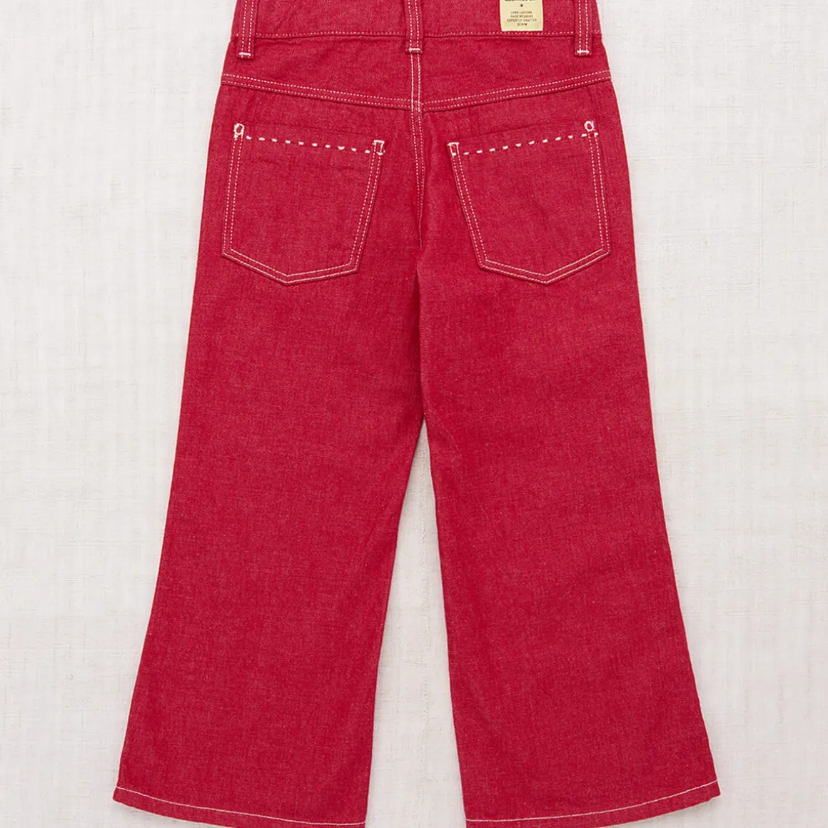 Slim Flared Jeans in Vintage Red Denim by Misha & Puff