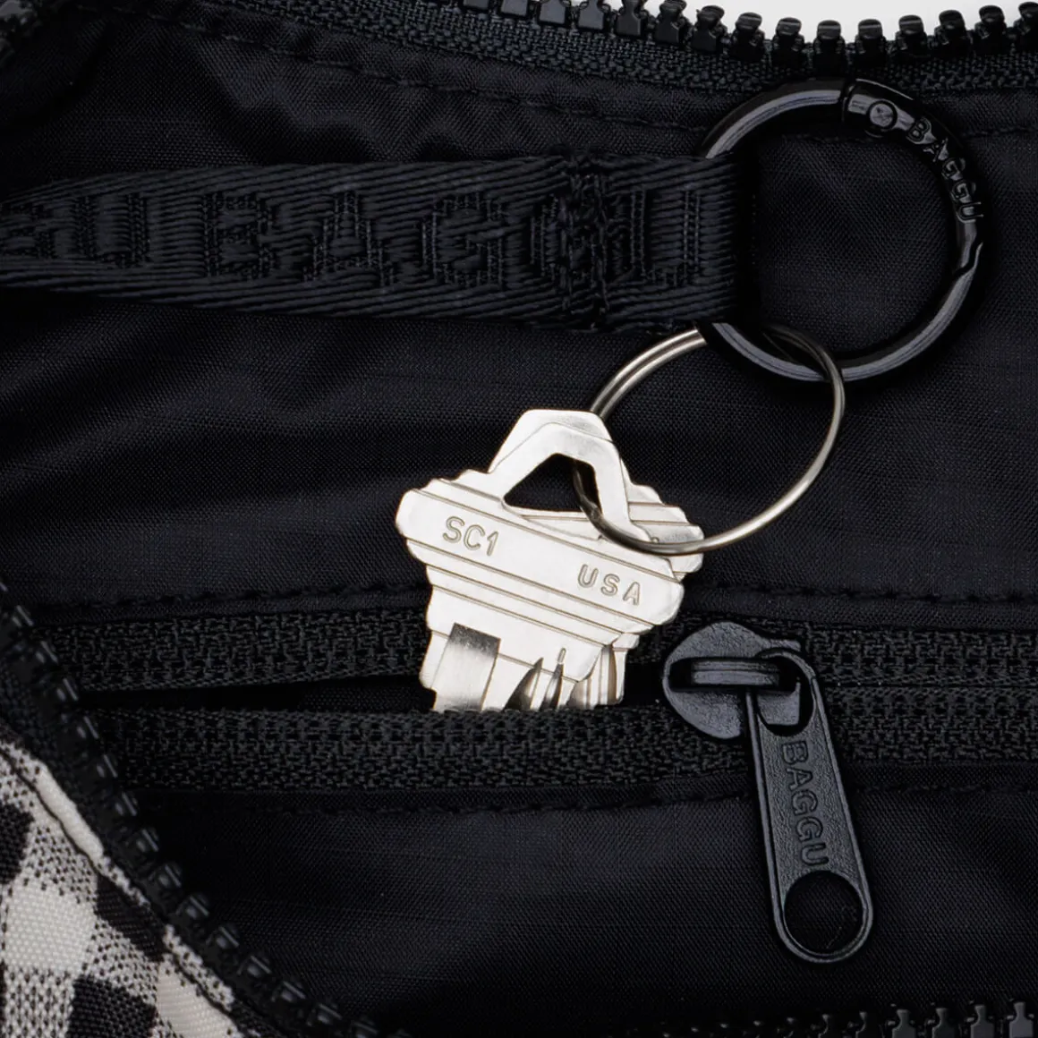 Small Nylon Sling in Black and White Gingham by Baggu