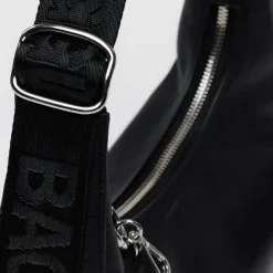 Small Recycled Leather Crescent Bag in Black by Baggu