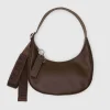 Small Recycled Leather Crescent Bag in Brown by Baggu