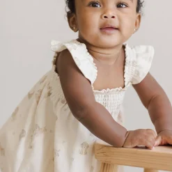 Smocked Jersey Dress in Puppies by Quincy Mae