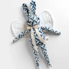 Winged Rabbit in Block Printed Sky by Polka Dot Club